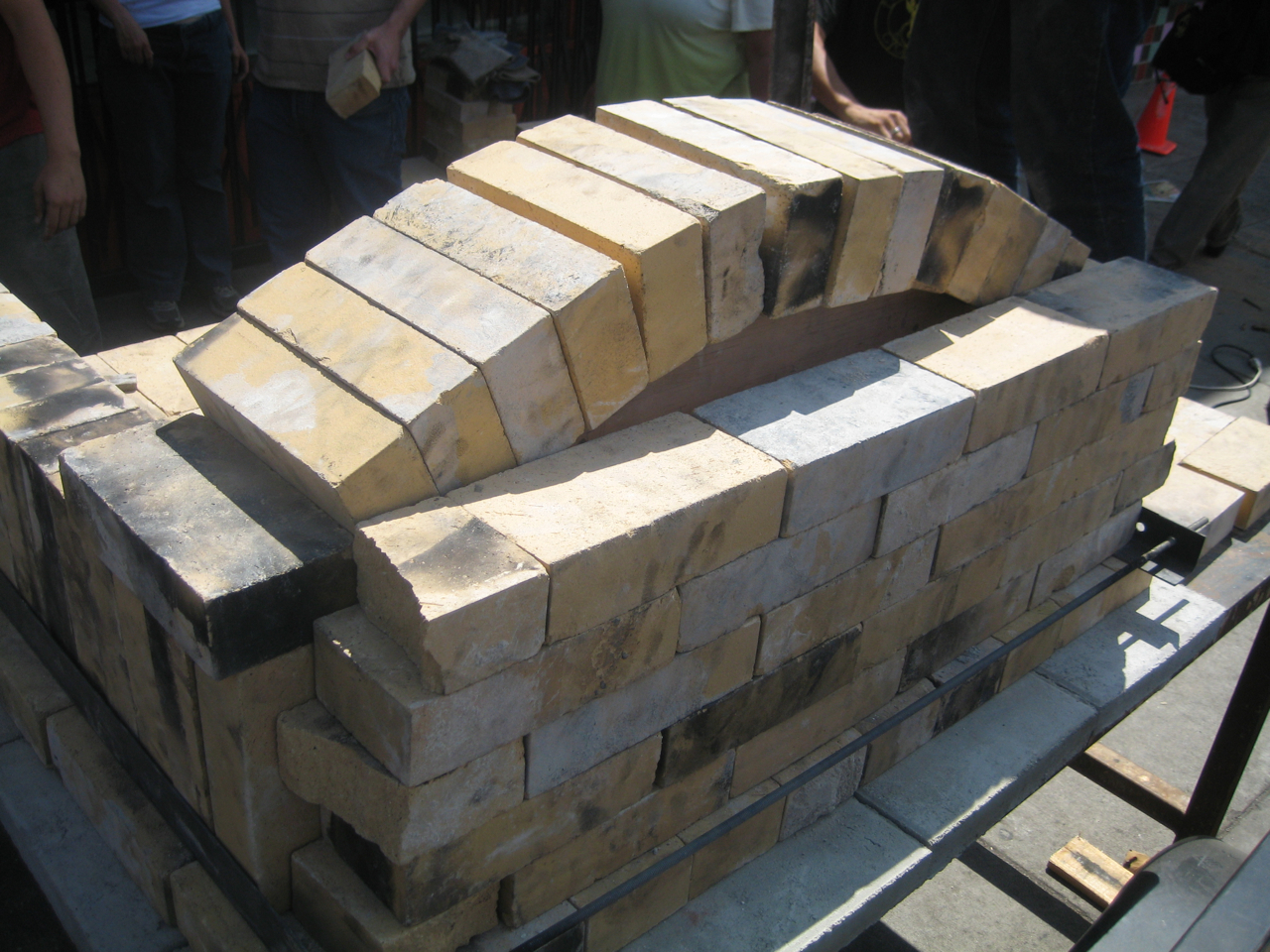 small shard of broken brick helps maintain the spaces that occur by